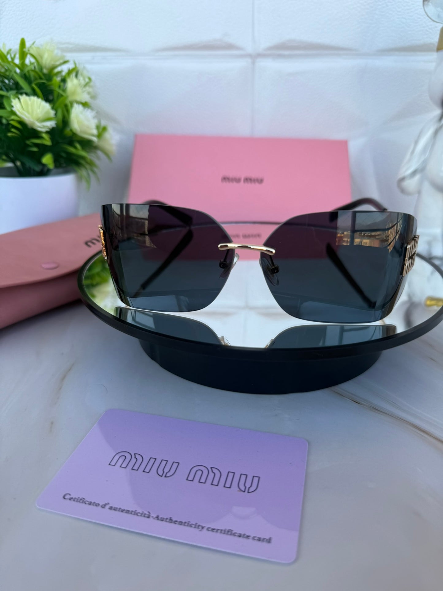 Lentes miumiu