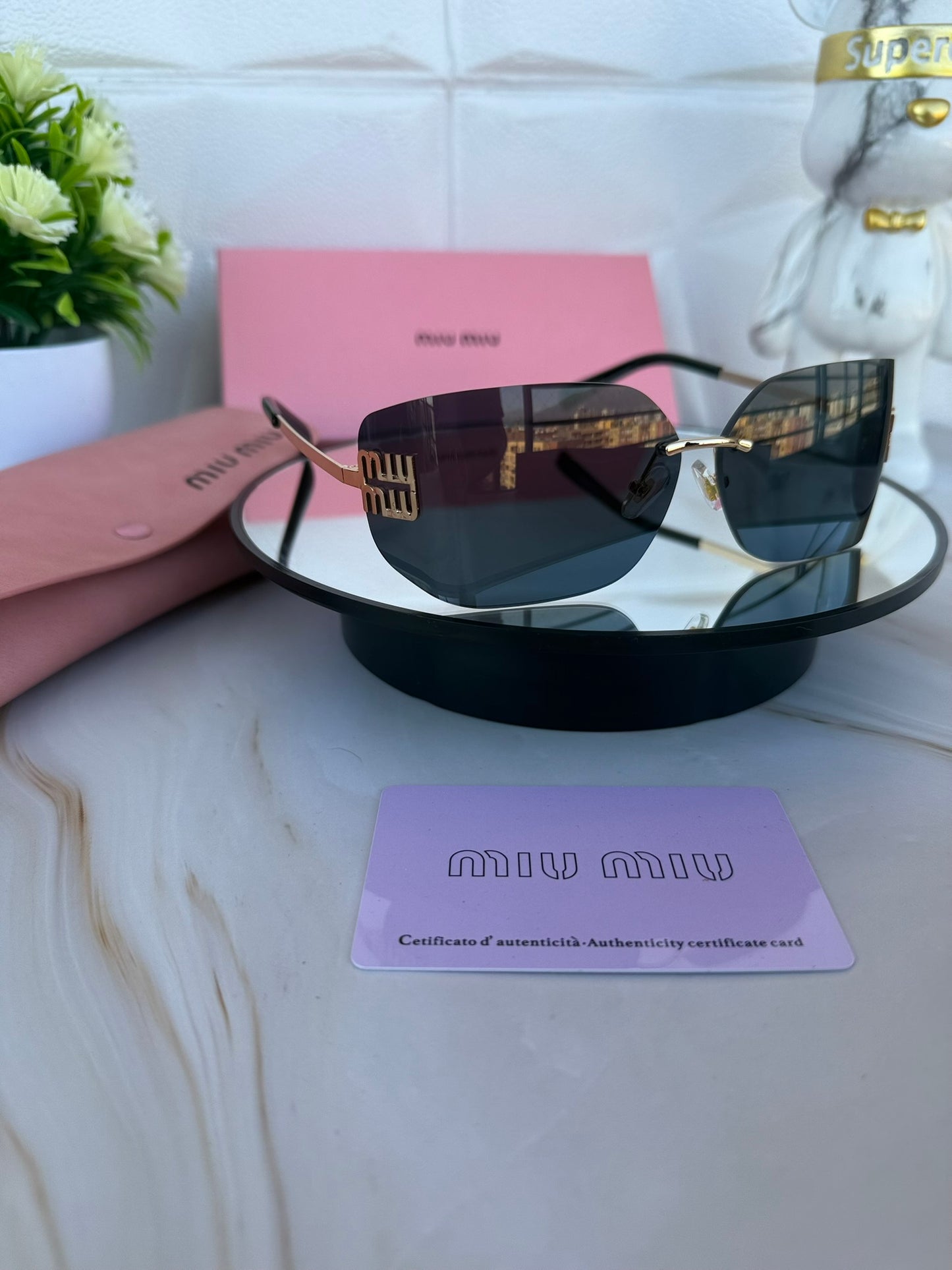 Lentes miumiu