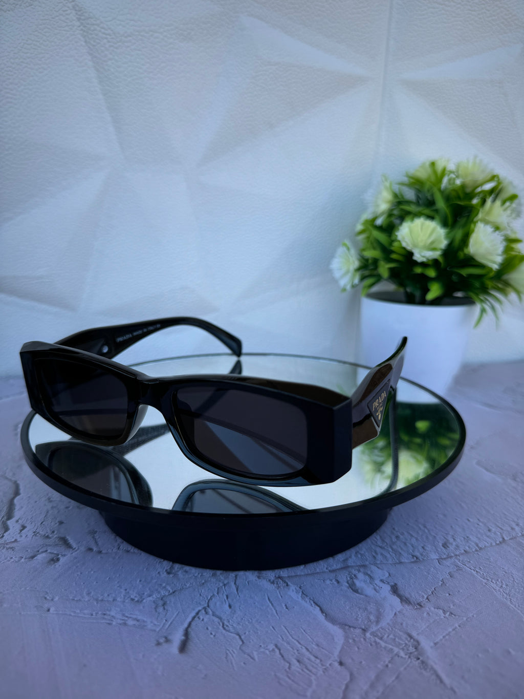 Lentes de sol prada