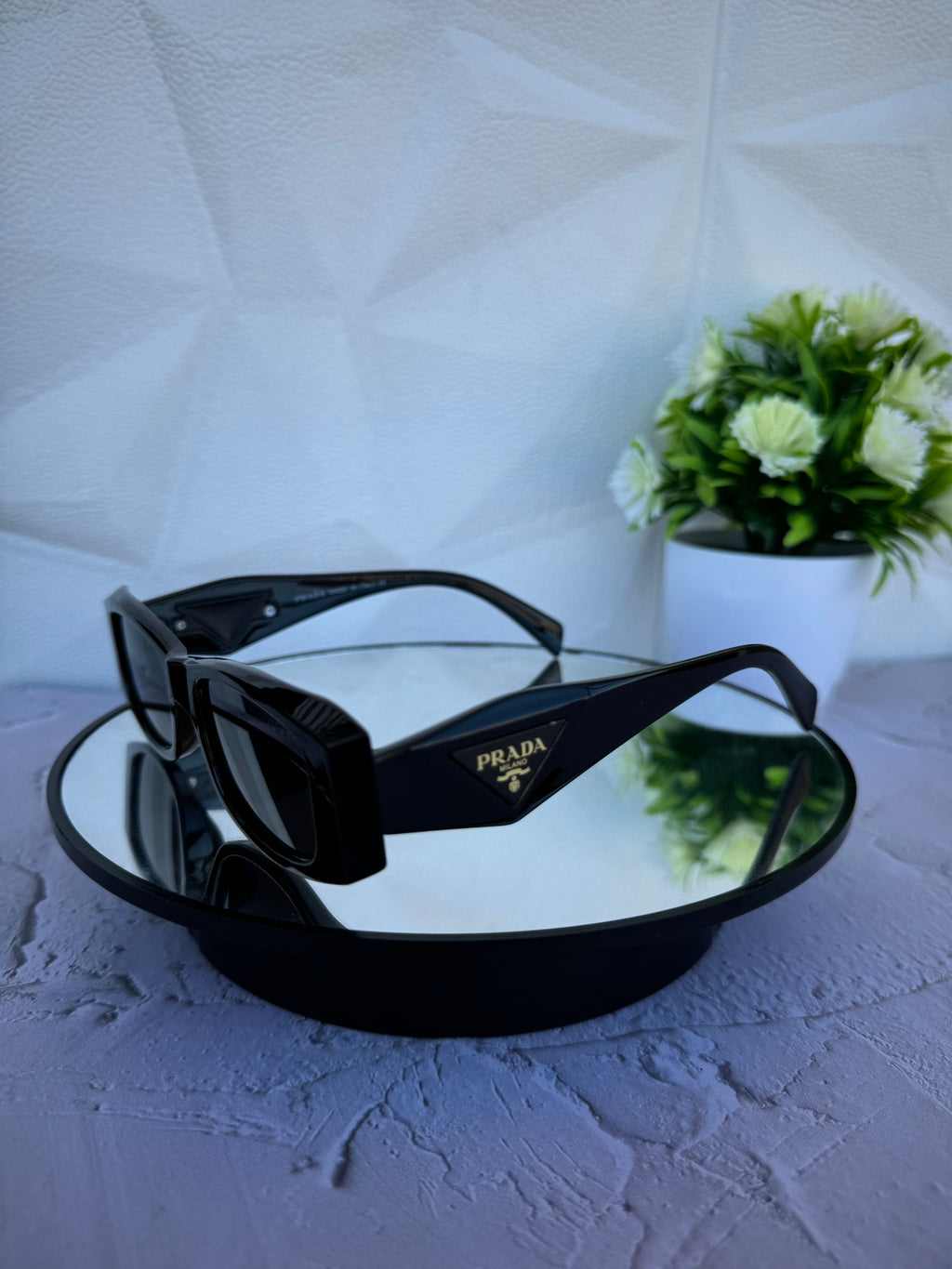 Lentes de sol prada
